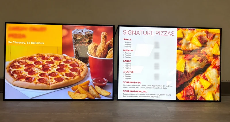 Winnipeg LED lightbox project: pizza advertising beside menu information