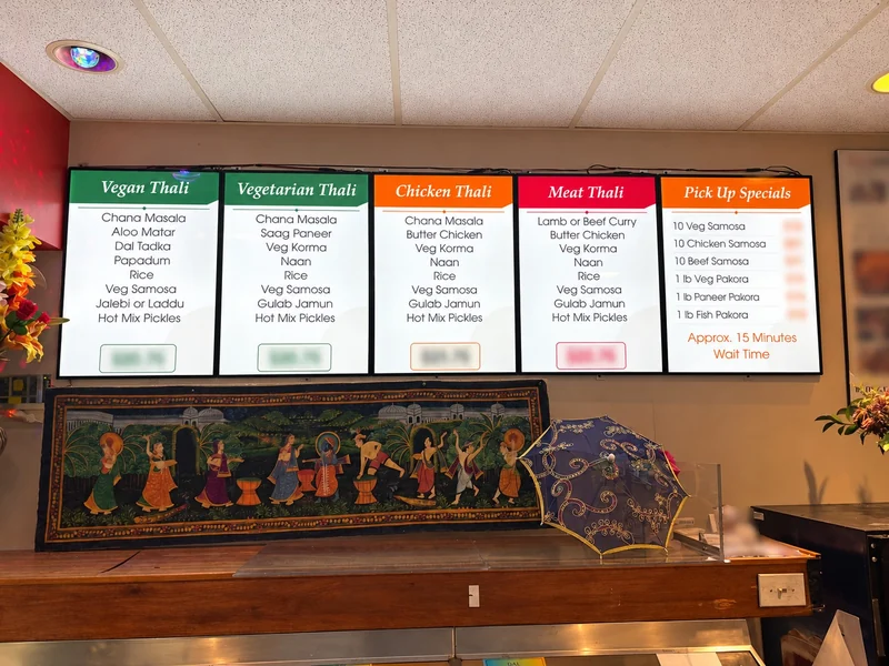 Real TDD restaurant project with five LED-backlit printed menu lightboxes